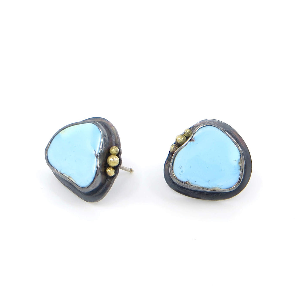 Golden Hill turquoise stud earrings. 3 18k royal yellow gold balls on top of each. Oxidized silver settings. Rounded triangular shape .6" x .6"  Sky-robin's egg blue.