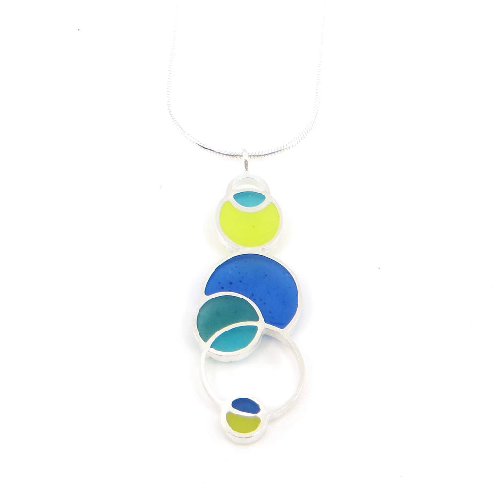 Sterling silver and pigmented resin open circles geometric pendant. Blue. Apple green. Teal. Turquoise. "Spring" Colors. Pendant is 1.5" and sterling snake chain is 16". Geometric.