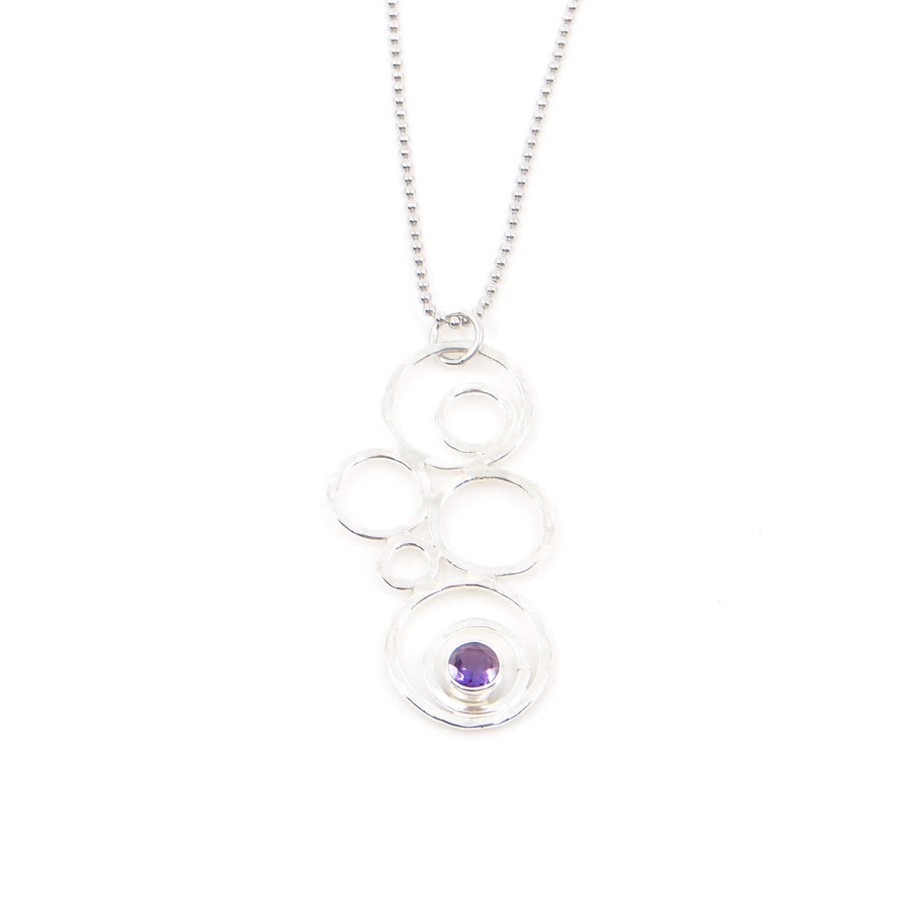 Hammered argentium silver circles-bubbles-of different sizes pendant with 3.5 mm tube set amethyst. Bubblescence necklace. Sterling bead chain.