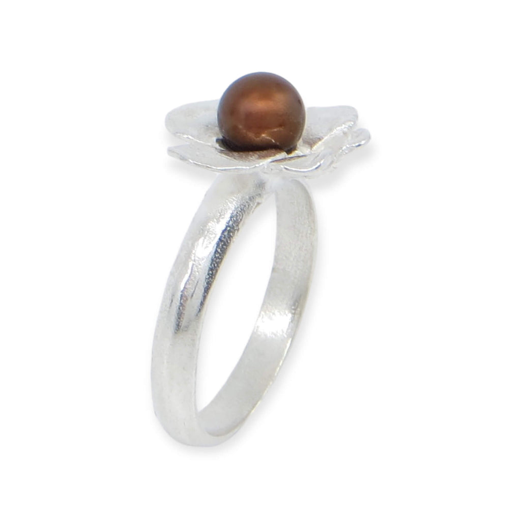 Curved sterling petals surround a chocolate pearl on this contemporary sterling silver ring. US size 5.75