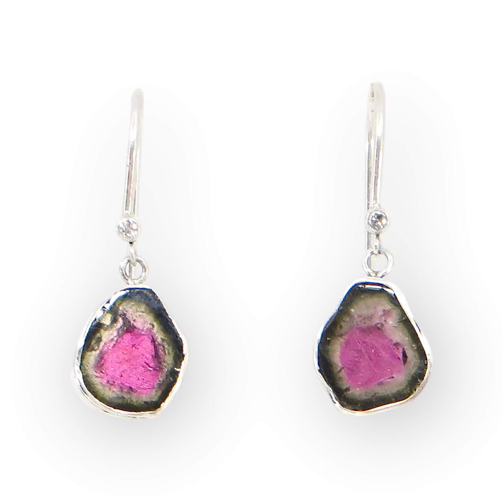 Tiny diamond and watermelon tourmaline dangle earrings. Sterling and fine silver settings. Tourmalines dangle from tube set diamonds attached to ear wires. 1" total length.