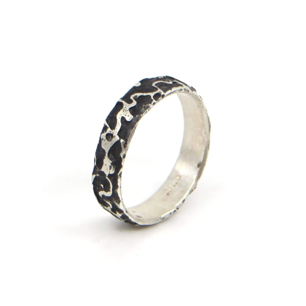 Etched Sterling silver ring with organic pattern.  Black patina is in the recesses.  US Size 7.