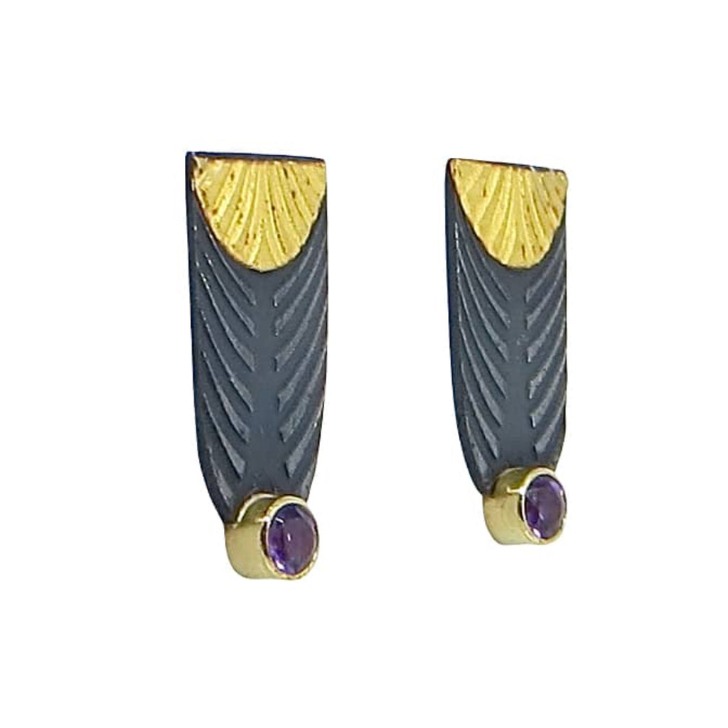 Etched silver earrings with curved patterns.  24k royal yellow gold  gold top. 18k royal yellow gold settings with  round purple amethysts at bottom of earrings.