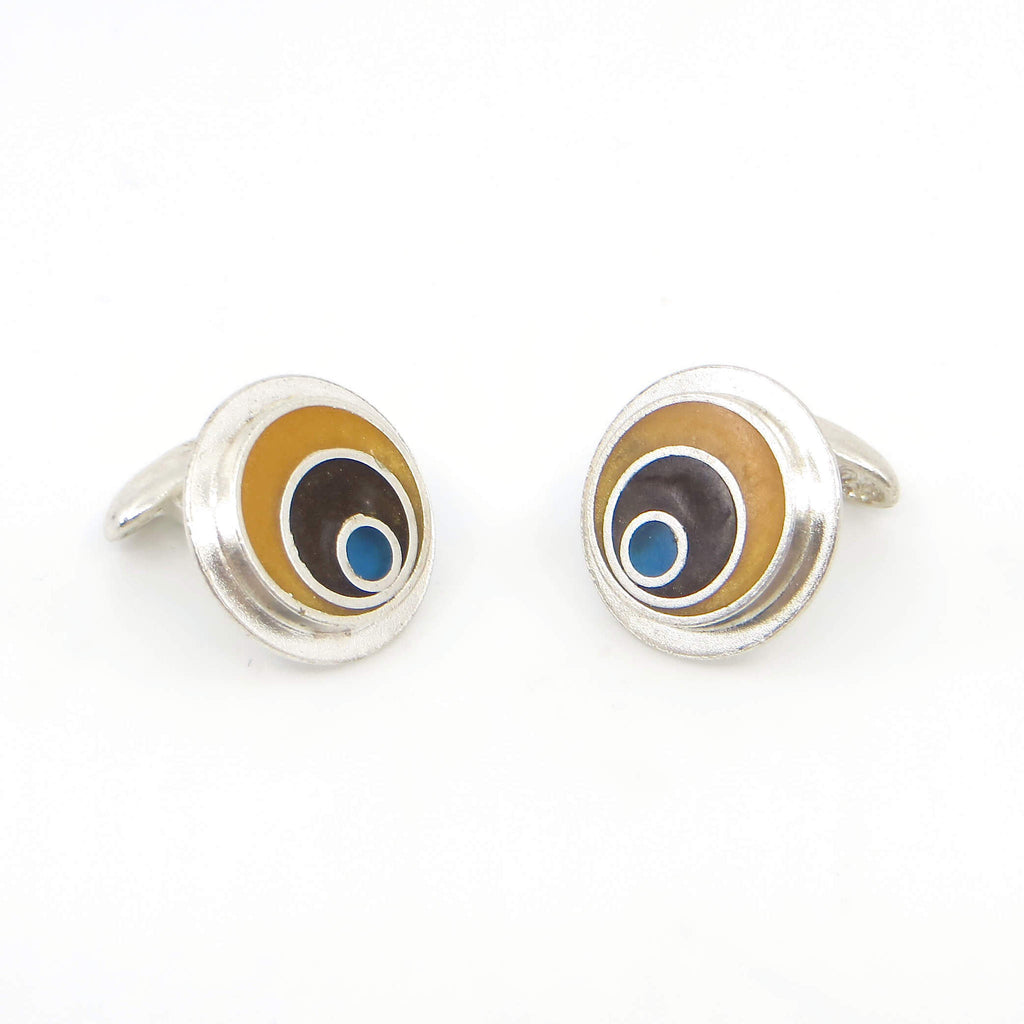 Sterling silver and resin inlay cufflinks. Maize outer ring, chocolate brown middle ring, blue dot.  