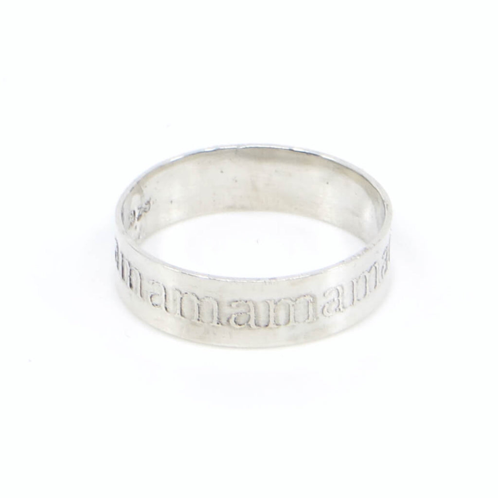 Sterling silver ring band with raised text going all around that says mamamamamama....