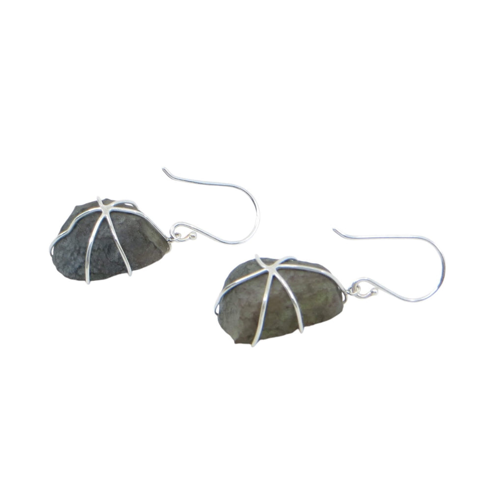 Petite split geode dangle earrings. Sterling silver cage prong settings with sterling ear wires. Darker grey to light grey bands of color with lights grey center crystals. Subtle elegance.