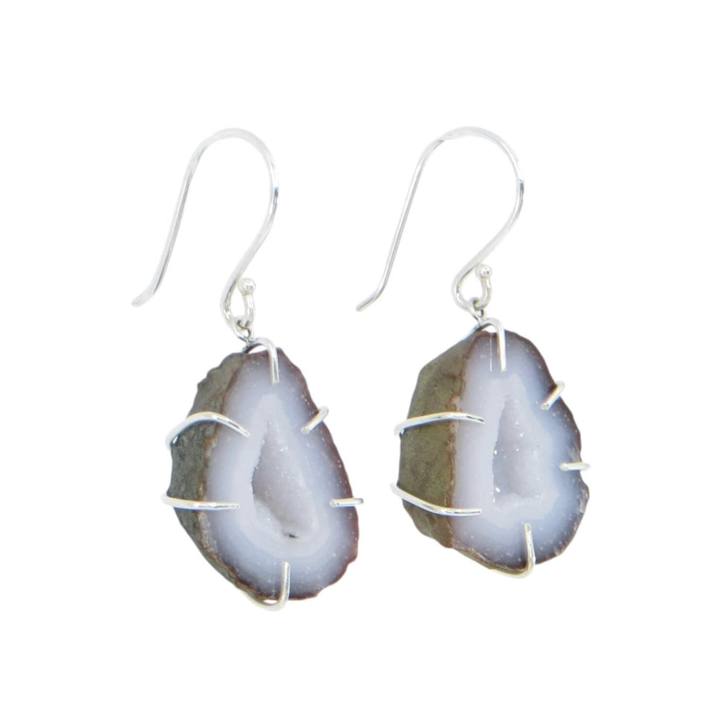 Petite split geode dangle earrings. Sterling silver cage prong settings with sterling ear wires. Darker grey to light grey bands of color with lights grey center crystals. Subtle elegance.