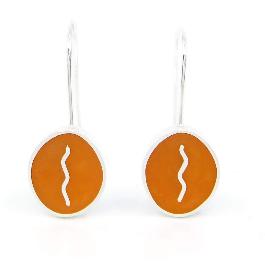 Sterling silver dangle earrings with chunky vertical ovals. Veritical center sterling squiggle in orange resin inlay.