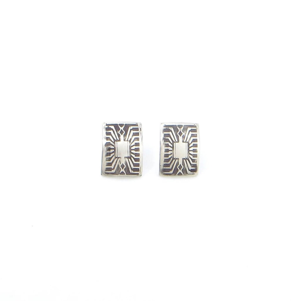 Sterling silver rectangle earring studs. Circuit board pattern with black patina in the recesses. Slightly curved.  .4" x .6"