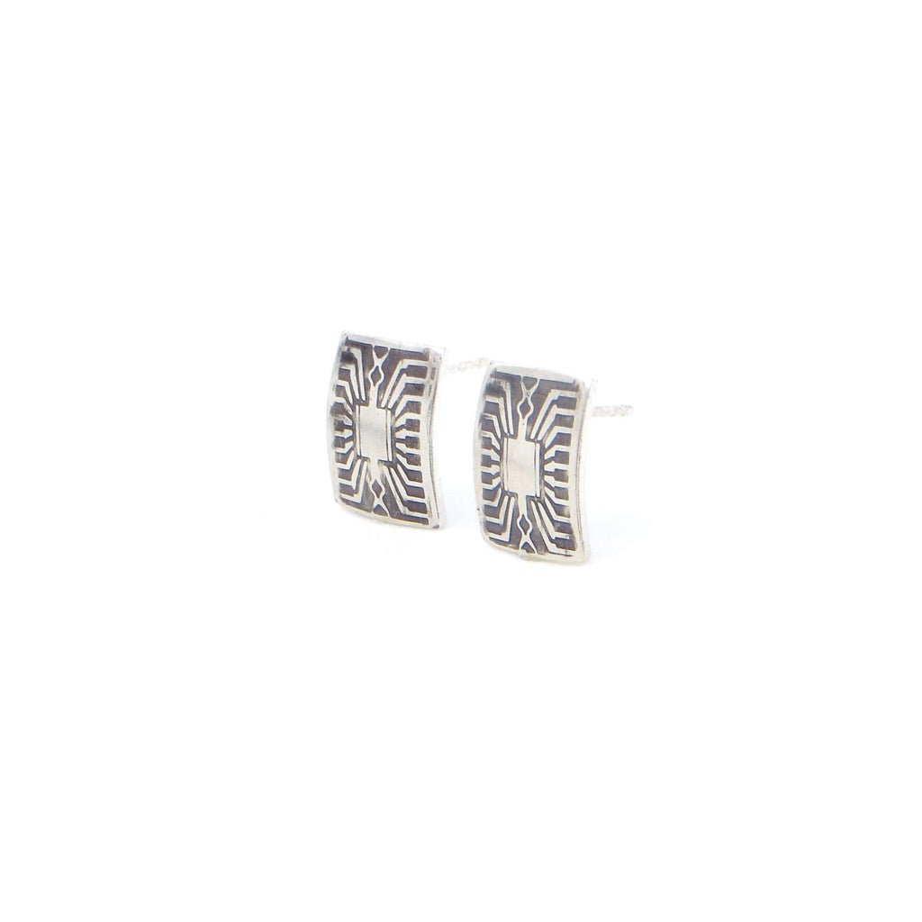 Sterling silver rectangle earring studs. Circuit board pattern with black patina in the recesses. Slightly curved.  .4" x .6"