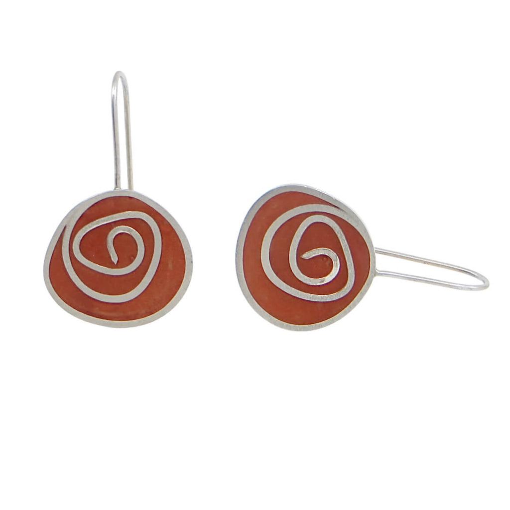 Sterling silver swirls earrings with rust color pigmented resin.