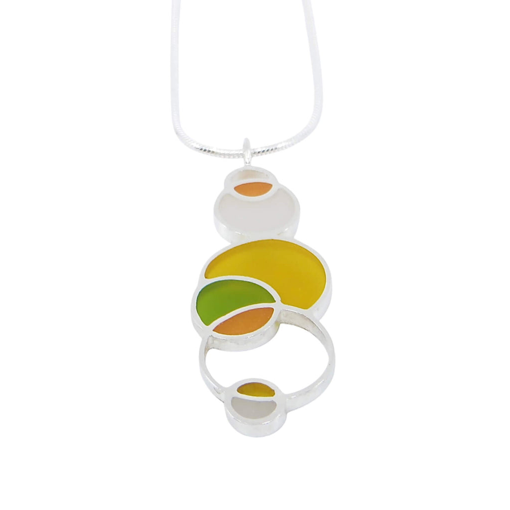 Open circles with colors pendant necklace. Sterling silver. Resin Inlay. Citrus colors. Tangerine. Orange. Lime. White. Sterling snake chain.