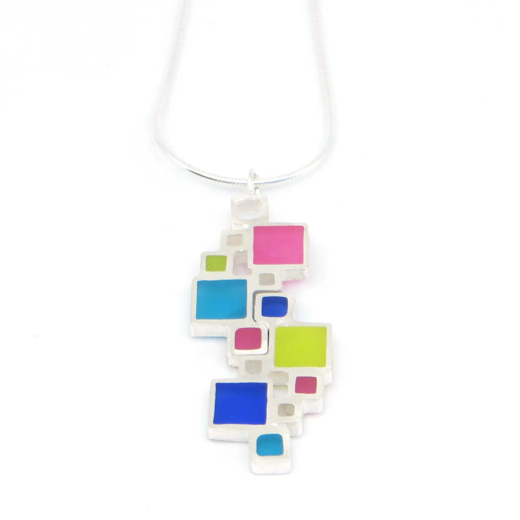 Sterling silver necklace with  colorful squares and open squares pendant on a white background