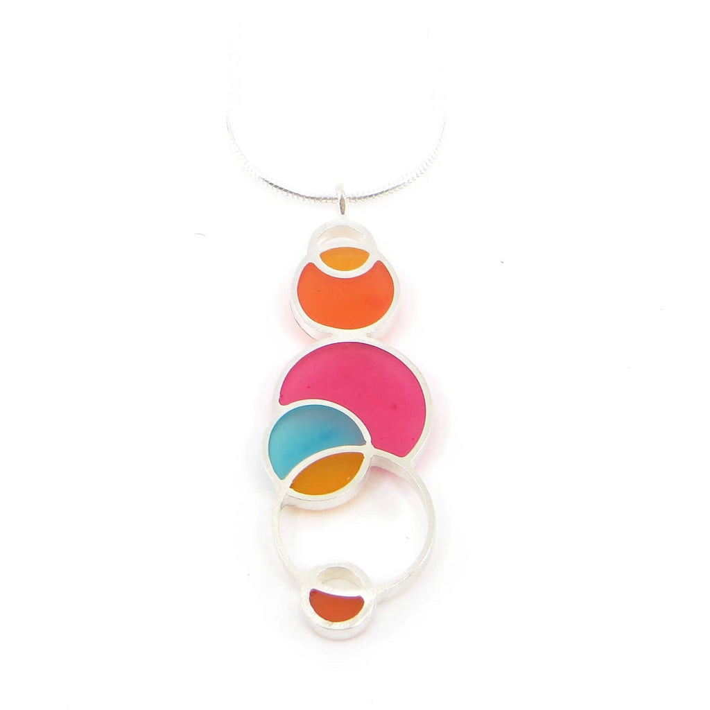 Sterling silver and pigmented resin open circles geometric pendant. Pink. Orange. Dark orange. Aqua. "Summer" Colors. Pendant is 1.5" and sterling snake chain is 16". Geometric.