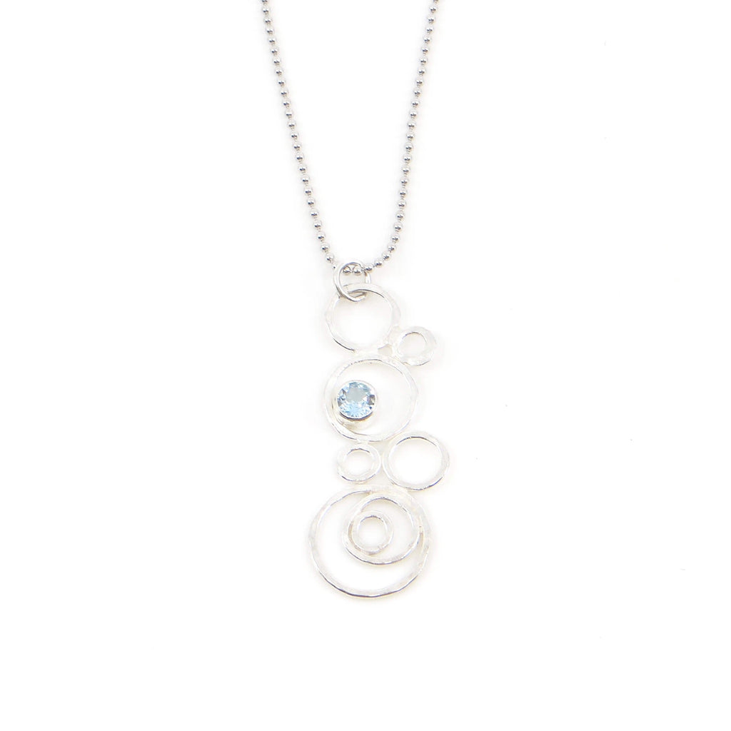 Hammered argentium silver circles-bubbles-of different sizes pendant with 3.5 mm tube set sky blue topaz. Bubblescence necklace. Sterling bead chain.
