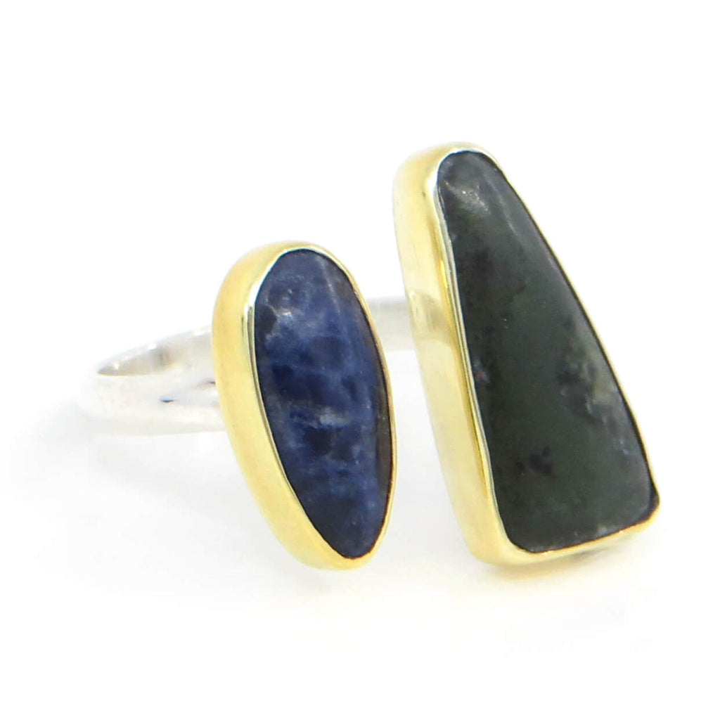Open top ring with rounded pear shaped sodalite and triangular New Zealand jade. Sterling silver domed band with 18k gold embellished fine silver bezels. Stunning blue and green. Fits sizes US 6-7.