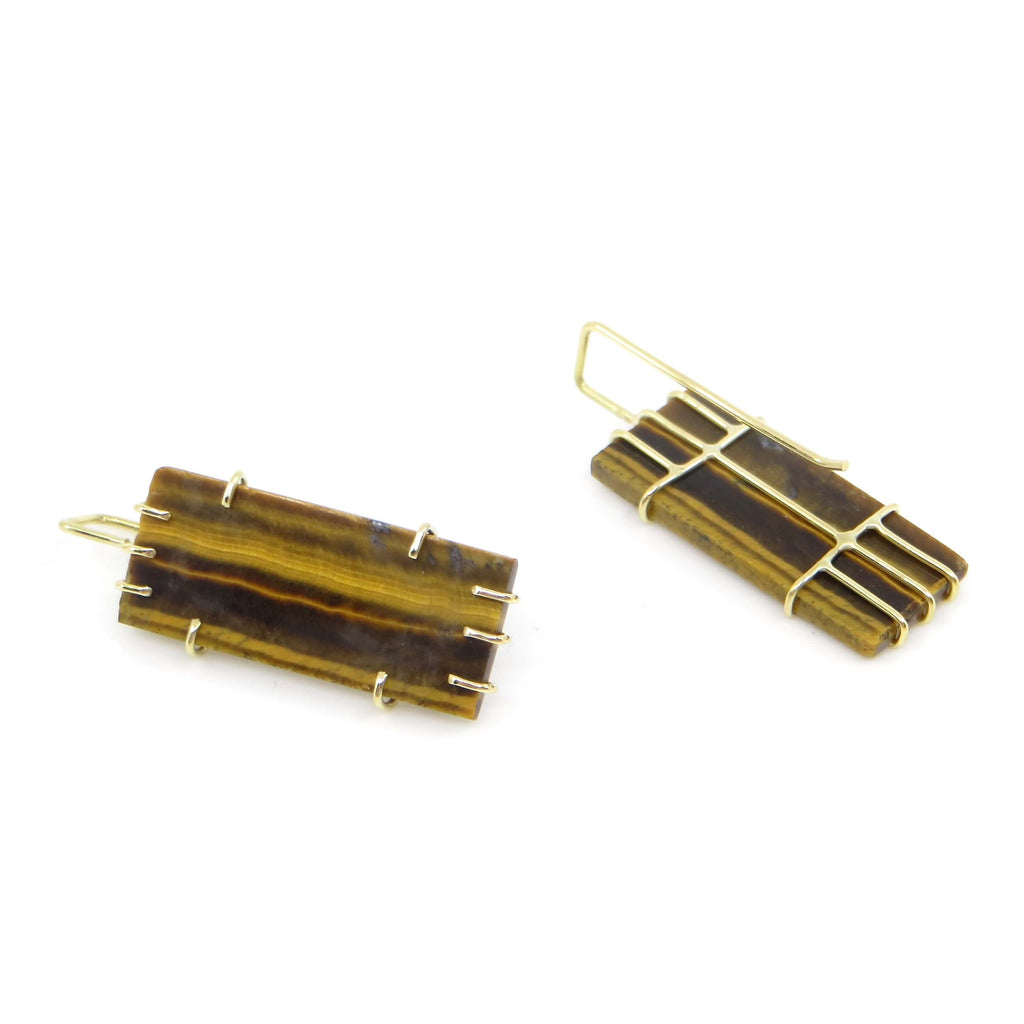Multi-color brown striped tiger's eye tiles set in 18k gold prong settings. Gold striped backings and square shaped earlier to complement the rectangular tile stone cut.