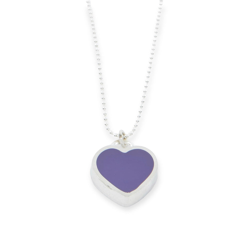 A "candy" heart pendant. A sterling silver heart frames richly colored pigmented resin to form a chunky little candy heart that hangs from a sterling silver bead chain. Heart is .5" Choice of 16" or 18" chain. Purple
