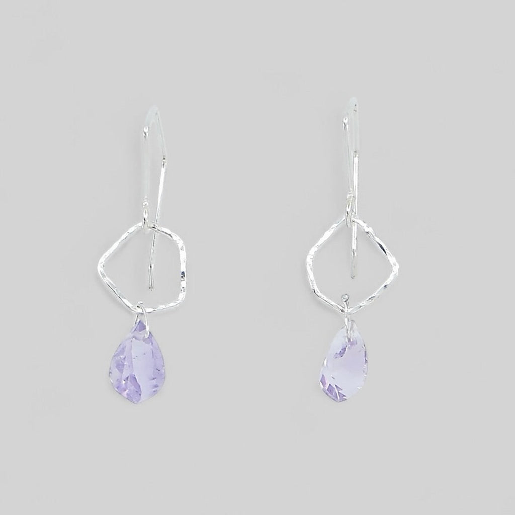 Cool angular amethysts hang from hammered sterling silver angled pentagon components. The ear wires have angles to complement the dangle earrings.