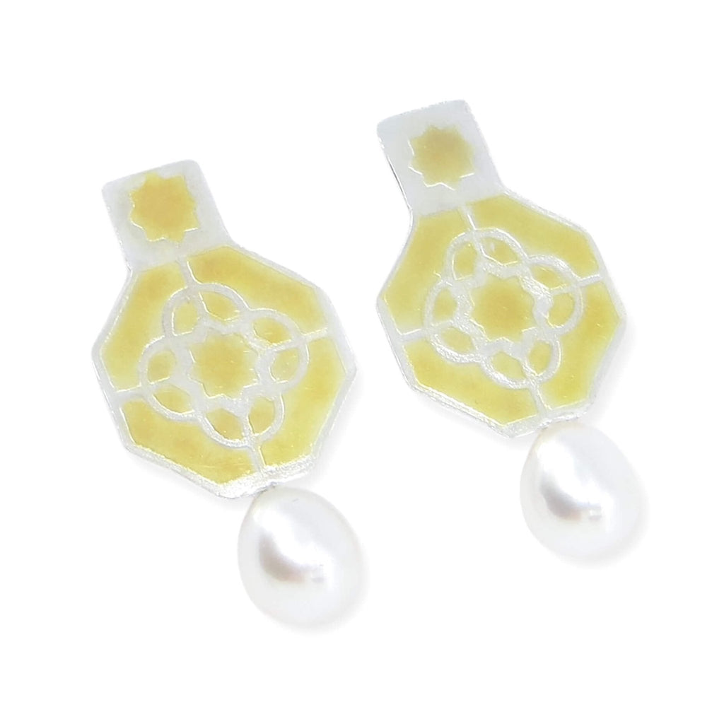 18k gold, sterling silver, and lustrous white pearl earrings. Etched geometric pattern on octagons with square top and etched 8 point star. Gold on high points of etched earrings. Contemporary elegance.