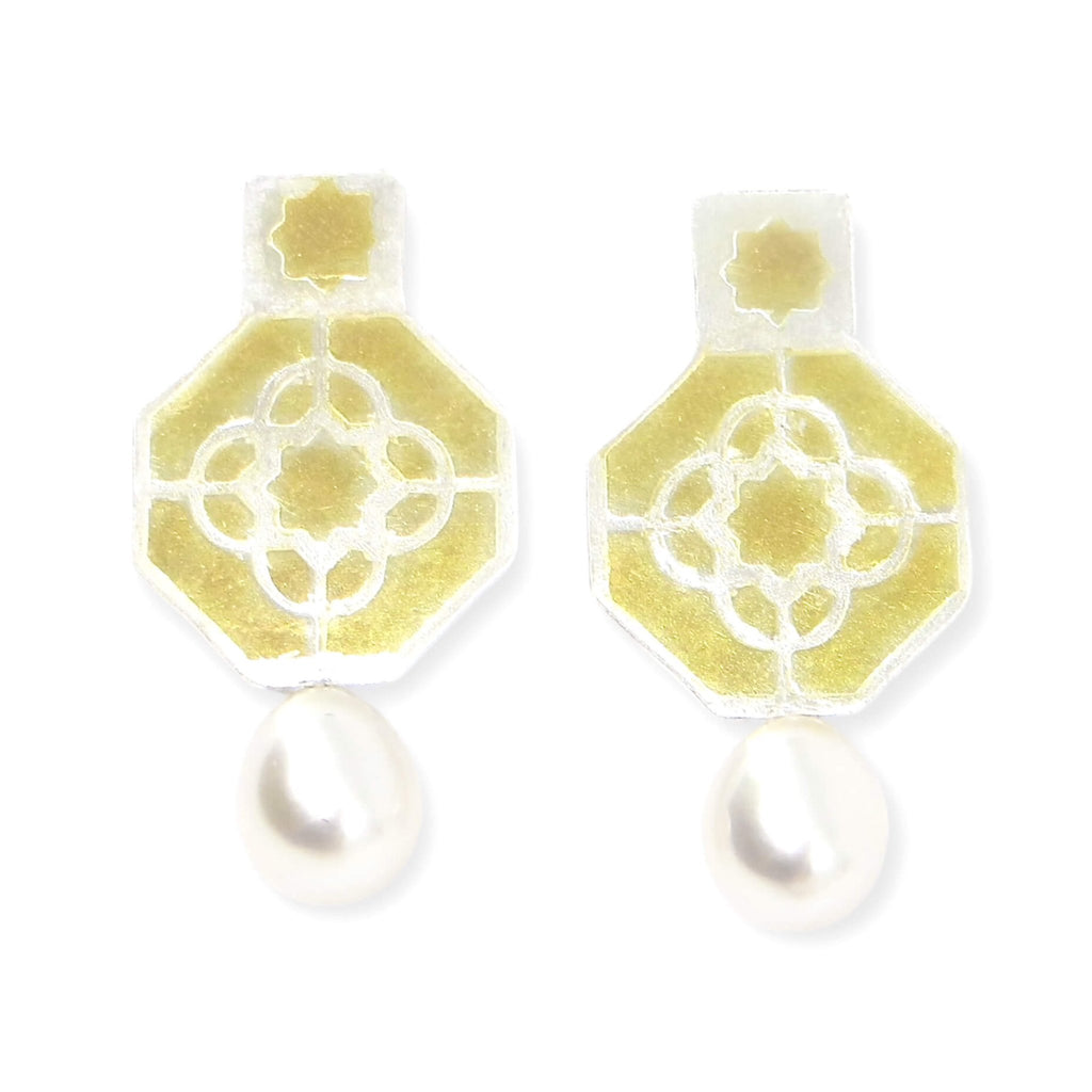 18k gold, sterling silver, and lustrous white pearl earrings. Etched geometric pattern on octagons with square top and etched 8 point star. Gold on high points of etched earrings. Contemporary elegance.