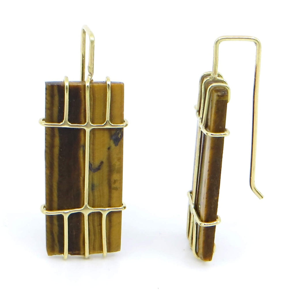 Rectangular Tigers Eye tiles with vertical golden and brown stripes set in 18k gold front cage prongs Stripes of gold in front over the stones with square angles ear wire hooks to complement stone angles.