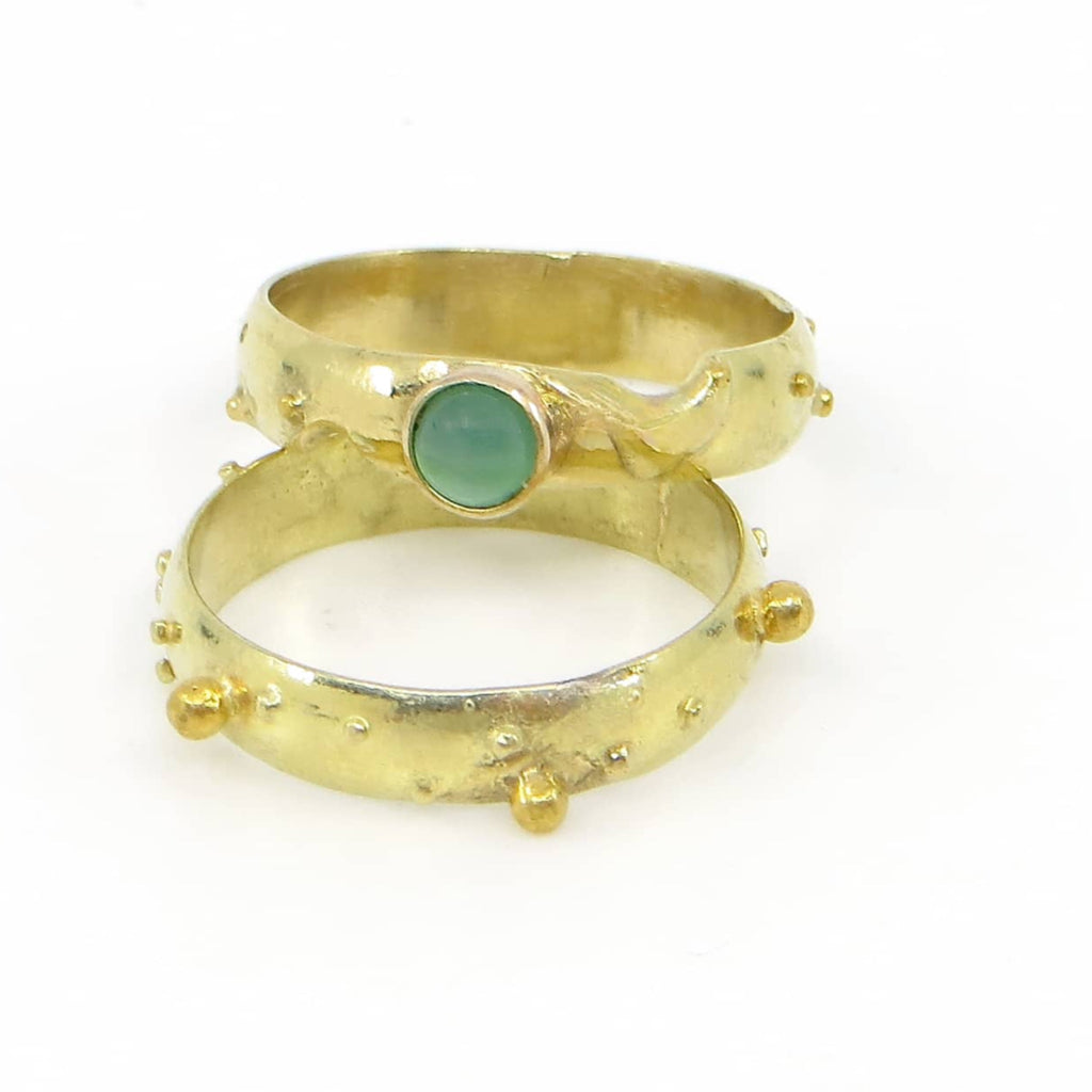 18k yellow gold ring set.  Various sized gold balls scattered around bands.  One band has a 14k set green chrysoprase.  Contemporary granulation.
