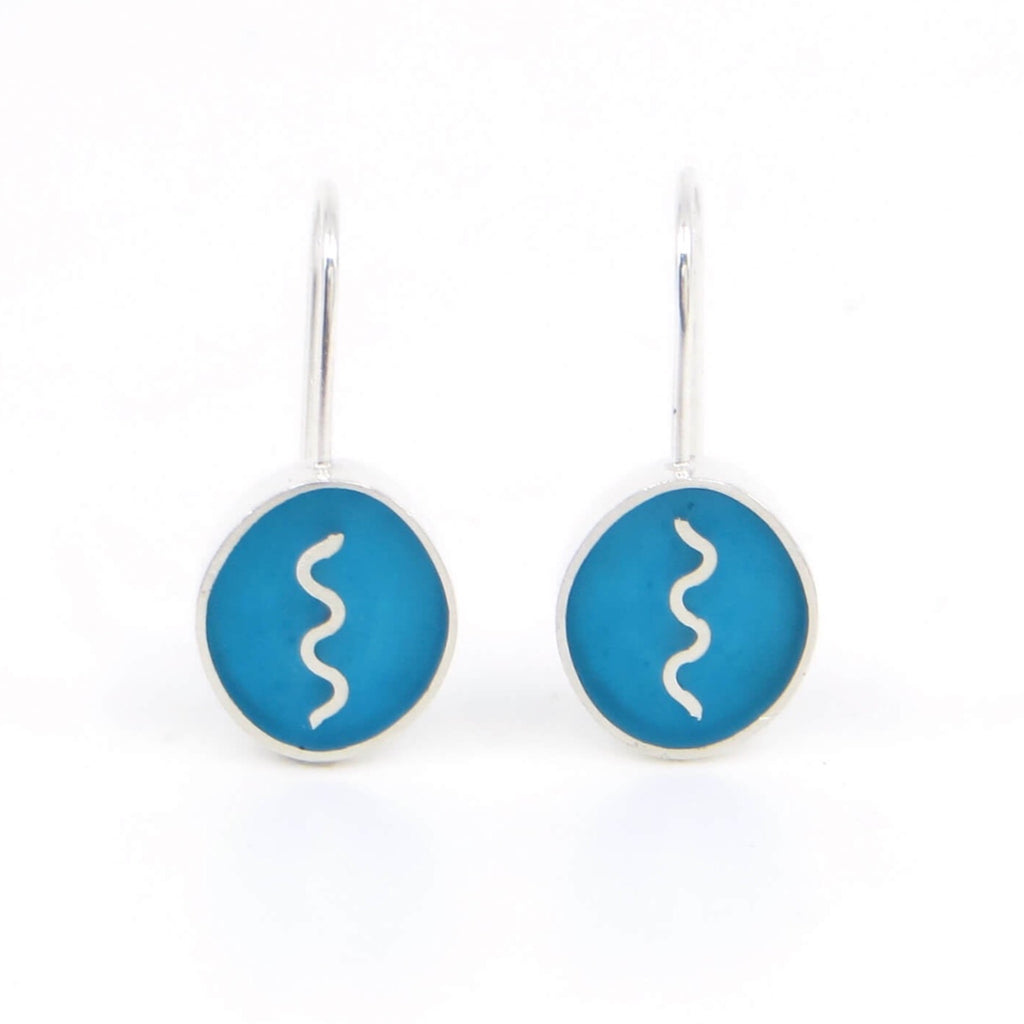 Sterling silver oval earrings with vertical sterling squiggle.  Turquoise resin inlay.