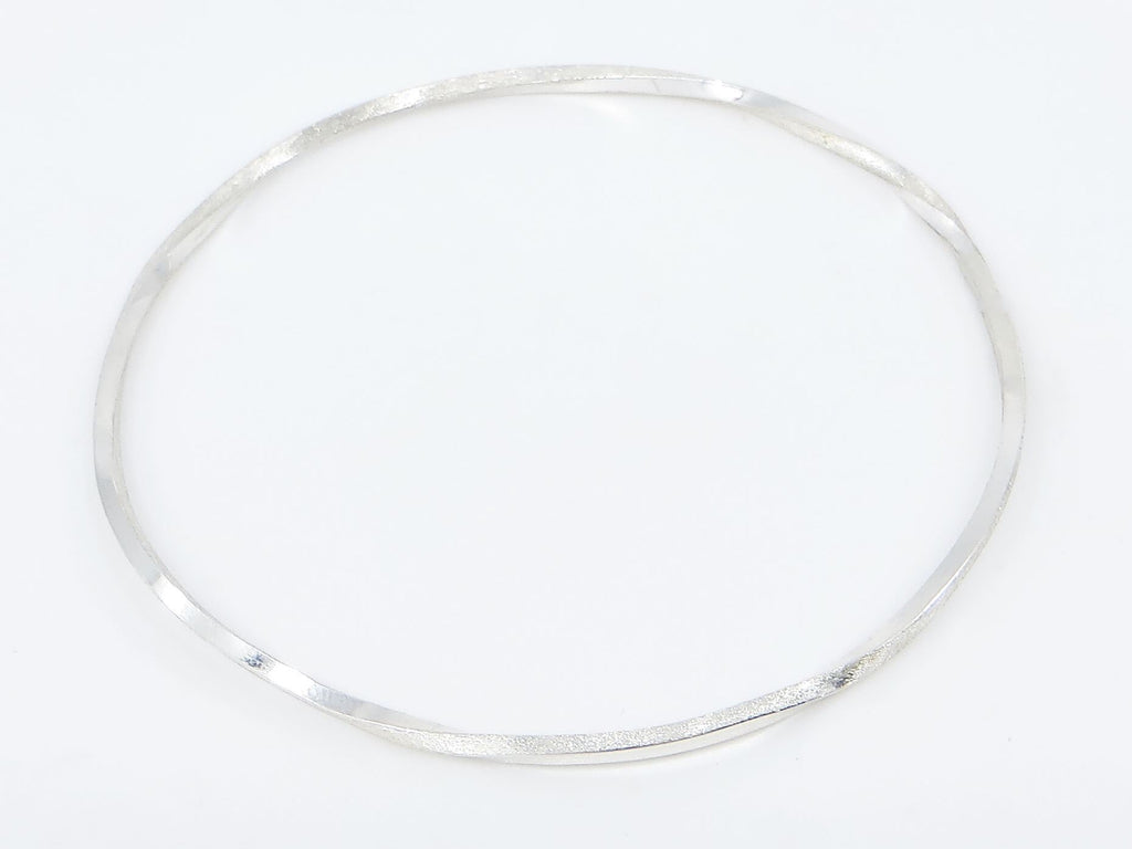Twisted square profile sterling silver round bangle.  Matte and high polish finish.