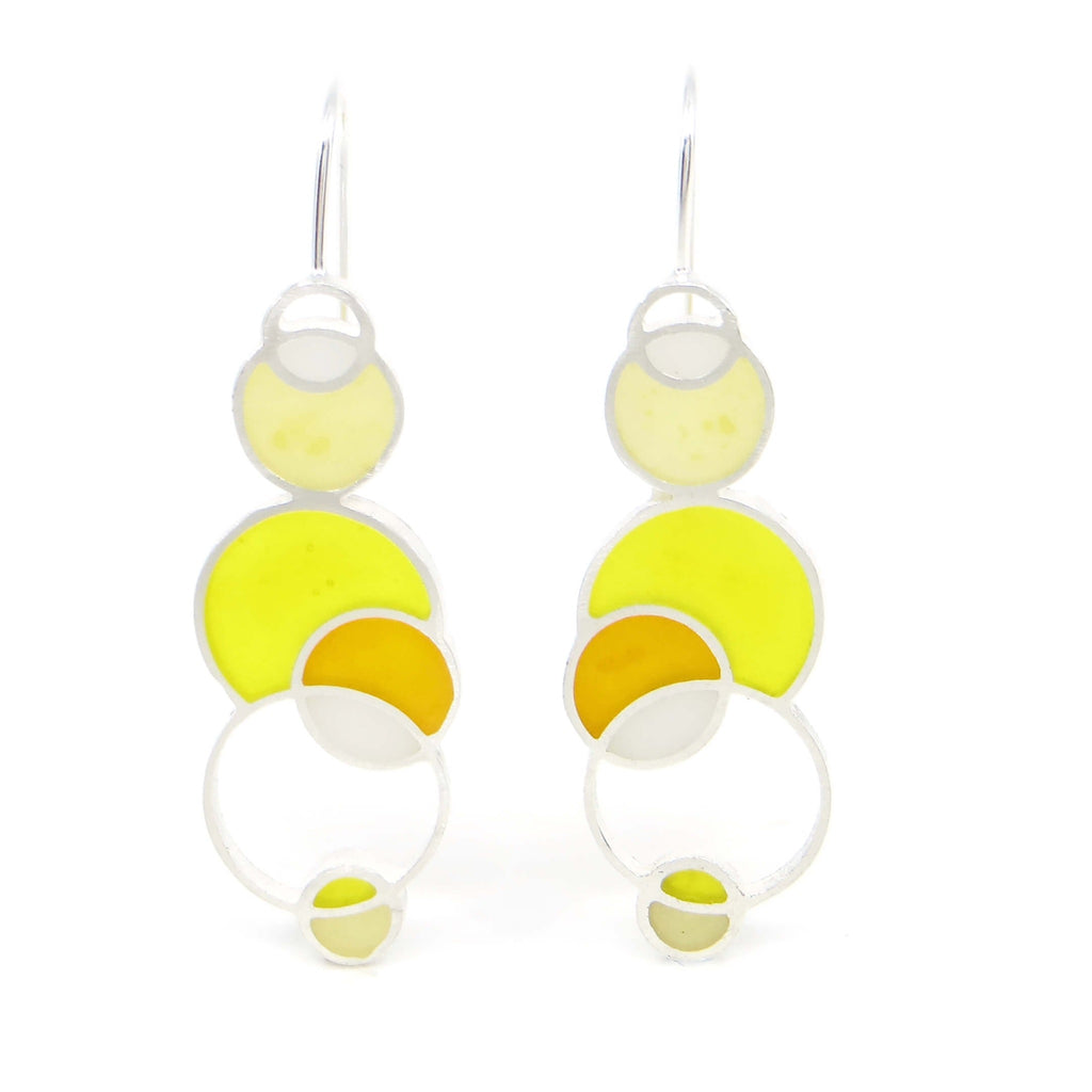 Sterling silver and pigmented resin inlay open circles earrings. White, Pale Yellow, Yellow, Orange Yellow. Contemporary.