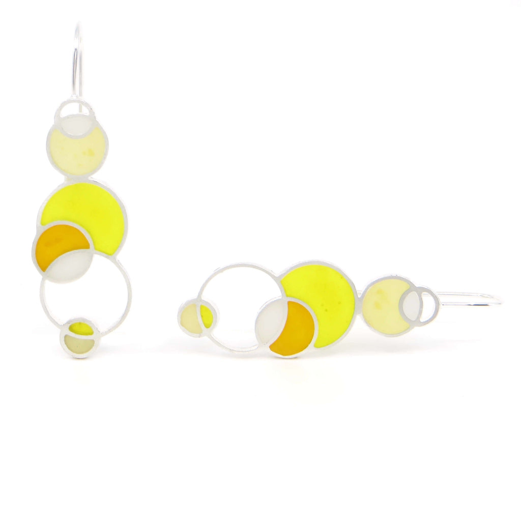 Sterling silver and pigmented resin inlay open circles earrings. White, Pale Yellow, Yellow, Orange Yellow.  Contemporary.